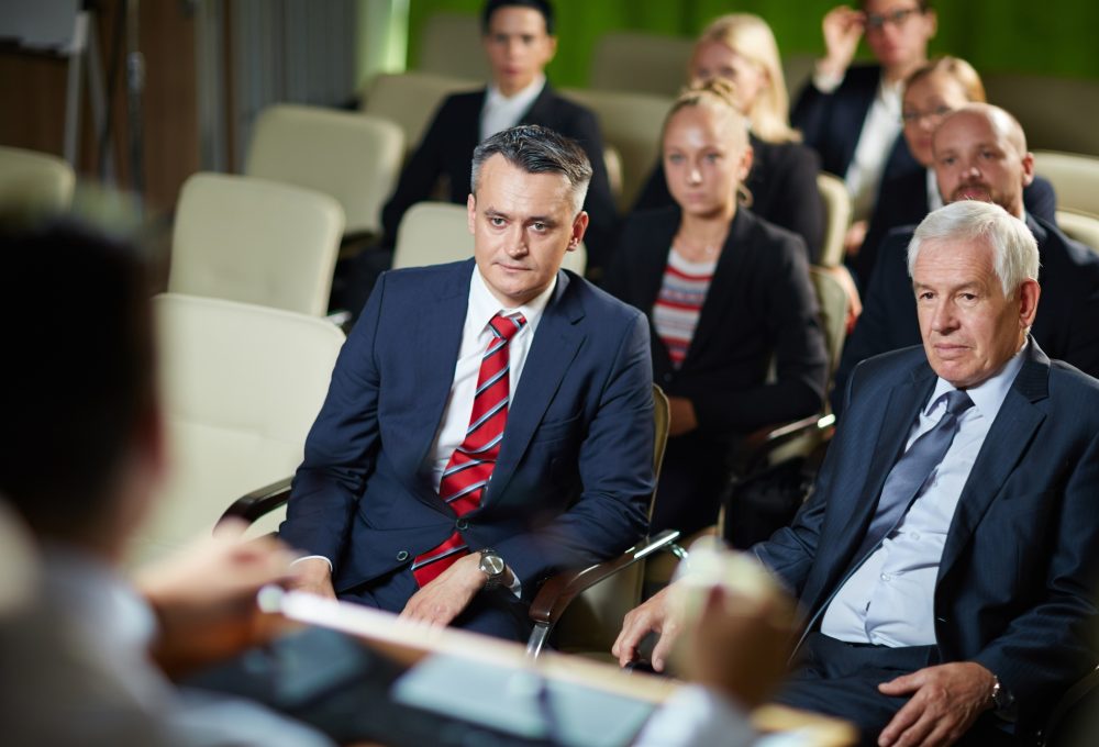 Audience listening at conference