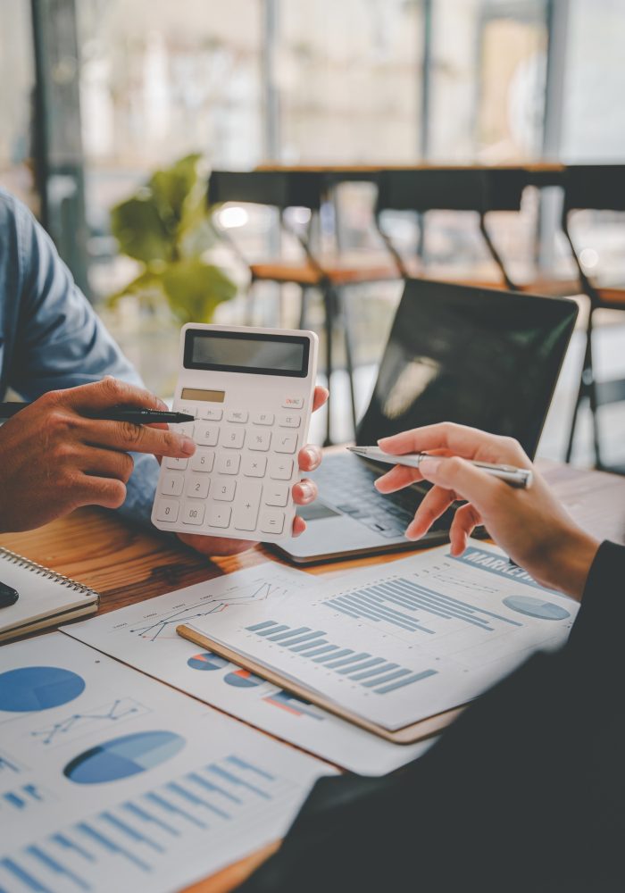 The financiers are calculating personal taxes for their customers.